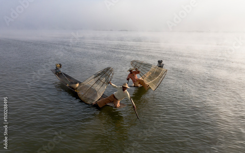 Aerial view of Mangrove fisherman fishing in beautiful Inle Lake, Myanmar. photo