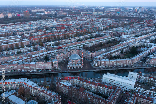 Aerial view of Western Mosque canalized river Schinkel in de foreground in Amsterdam West. Amsterdam, Noord - Holland, The Netherlands.