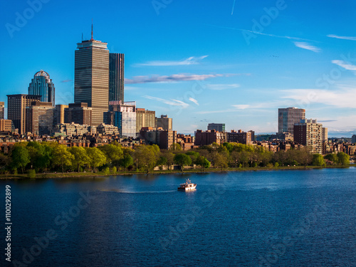 Aerial view of boston skyline with charles river and boats, boston, united states. photo