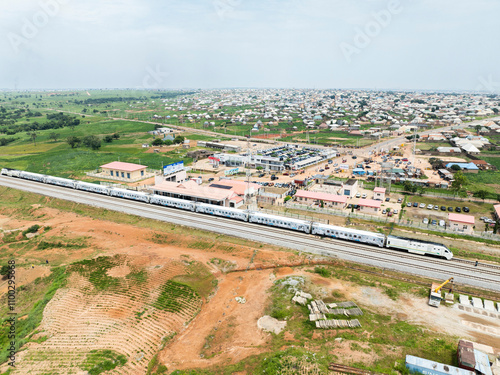 Aerial view of a beautiful suburban town with a railway and fields, Igabi, Kaduna, Nigeria. photo