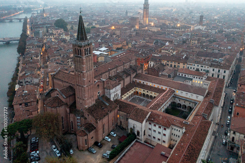 Aerial view of basilica di santa anastasia and adige river in a picturesque old town, verona, italy.