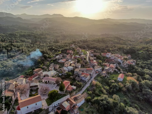 A small village with a few houses and a few trees