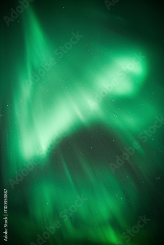 View of northern lights illuminating the night sky with stars, Reykjavik, Iceland. photo