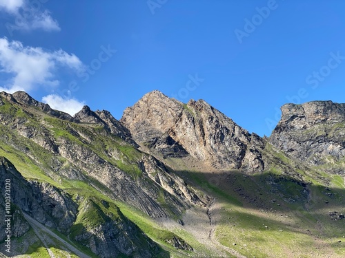 Rocky alpine peaks above Lake Melchsee or Melch Lake in the Uri Alps mountain massif, Kerns - Canton of Obwald, Switzerland (Kanton Obwalden, Schweiz) photo