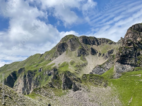 Rocky alpine peaks above Lake Melchsee or Melch Lake in the Uri Alps mountain massif, Kerns - Canton of Obwald, Switzerland (Kanton Obwalden, Schweiz) photo