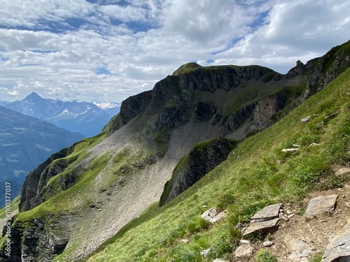 Rocky alpine peaks above Lake Melchsee or Melch Lake in the Uri Alps mountain massif, Kerns - Canton of Obwald, Switzerland (Kanton Obwalden, Schweiz) photo