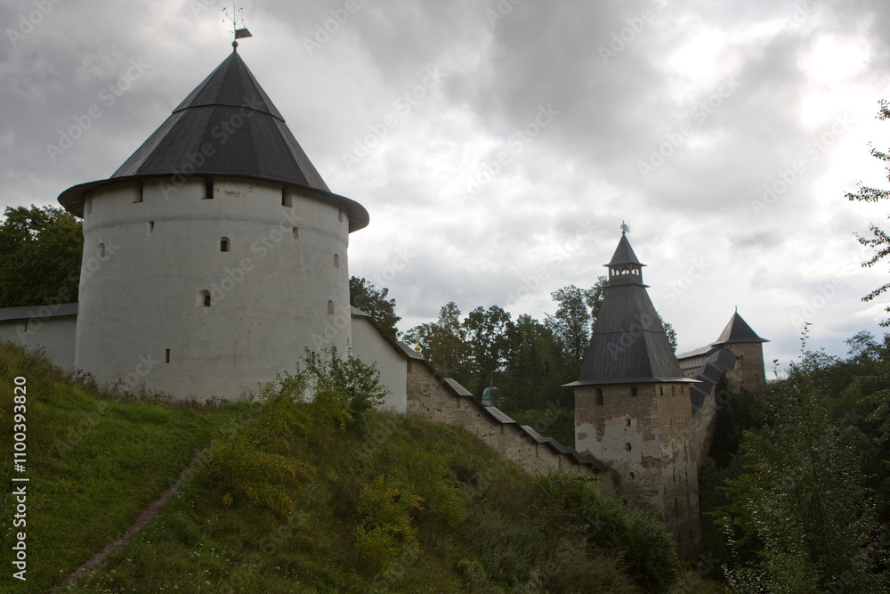 Obraz premium Russia Pskov region Pechersky monastery view on a cloudy summer day