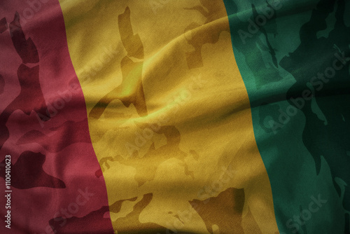 colourful waving flag of guinea on the old army khaki texture background. military concept.