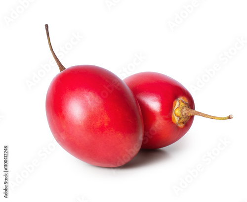 Two tamarillos fruit close up isolated on a white background photo