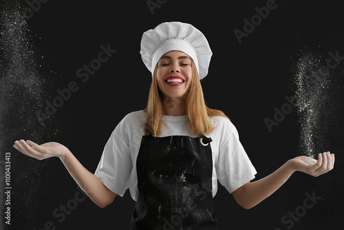 Cheerful female chef playin...