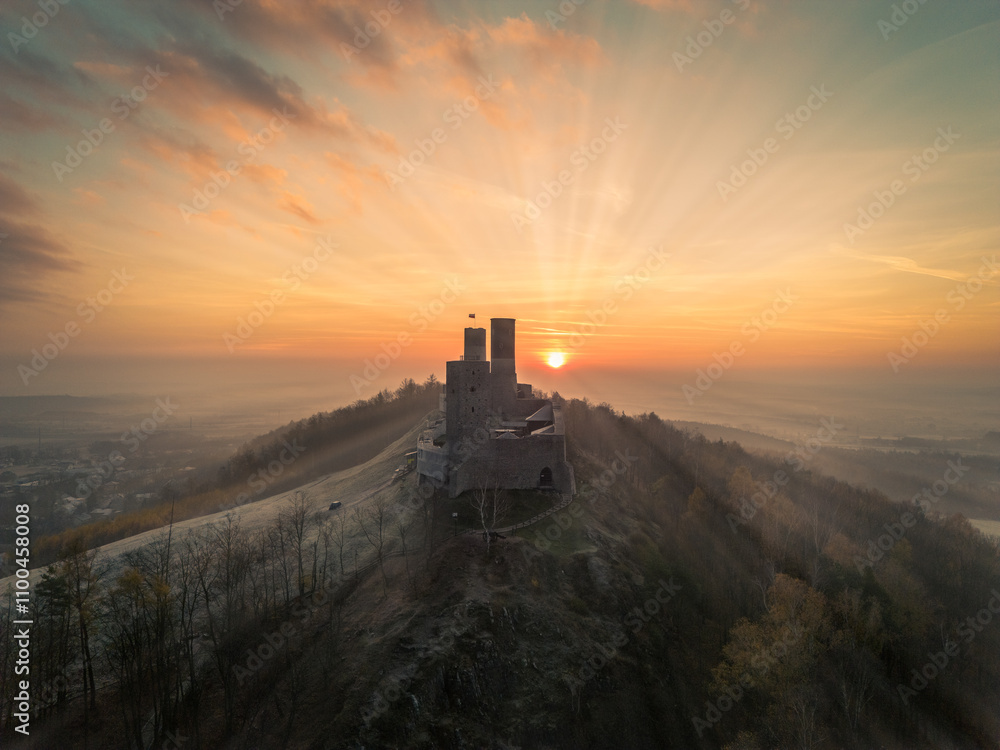 sunset over the medieval castle in chęciny
