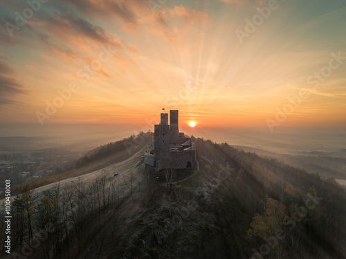 sunset over the medieval castle in chęciny