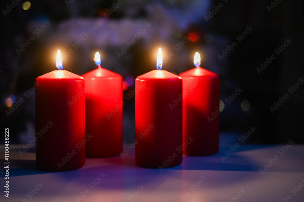 red Christmas candles burning for Advent red Christmas candles burning for Advent