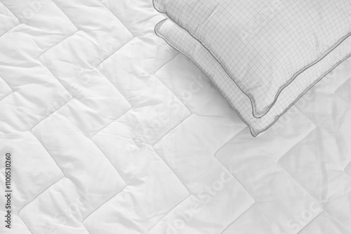Soft pillow on quilted whit...