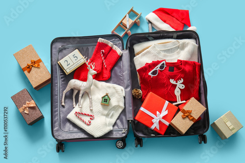 Suitcase with winter clothe...