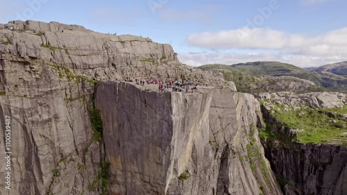 Tourists On Pulpit Rock Overlooking Lysefjorden