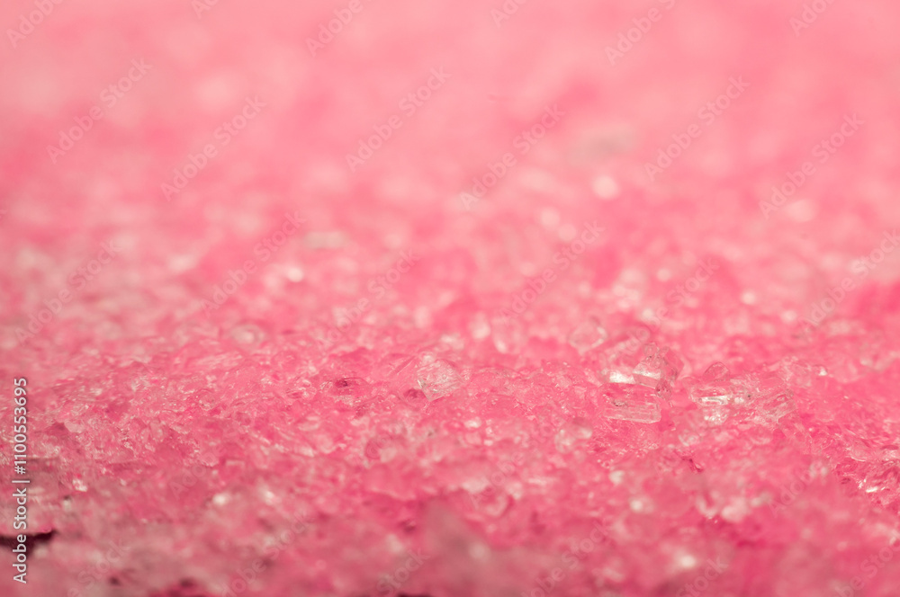 Close-up of sparkling pink crystals reflecting light in an abstract texture Close-up of sparkling pink crystals reflecting light in an abstract texture