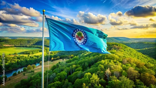 Aerial View of the Shawnee Tribe of Oklahoma Flag Billowing in the Wind, Showcasing Tribal Heritage Against a Scenic Landscape in Oklahoma photo