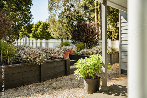 Front Garded with White Fence