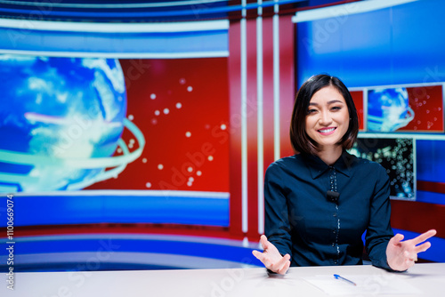 News anchor transmitting live news in newsroom, debating latest events and occurences around the world. Asian presenter hosting media segment on international tv program, daily headlines. photo