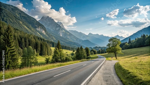 Asphalt road winding through picturesque Austrian Alps on a warm summer day, Austria, Alps, mountain, landscape, scenic