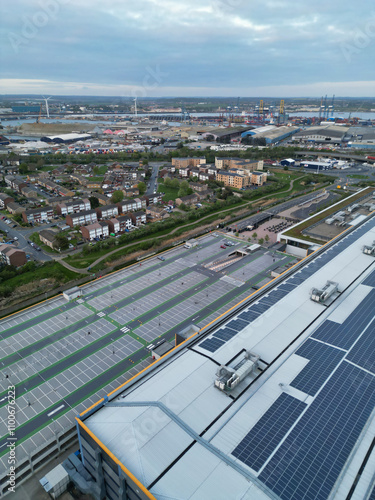 High Angle View of Tilbury City Centre and Docks on River Thames, borough of Thurrock, Essex, England, United Kingdom. Aerial View Was Captured with Drone's Camera on April 20th, 2024 at Just After Su photo