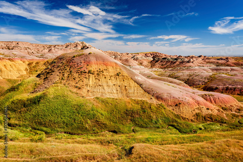 Rugged multi color plains, mountains and valleys of Badlands National Park near Wall, South Dakota photo