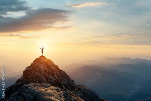 A silhouette of a person stands triumphantly on a mountain peak during a serene sunset, symbolizing achievement, exploration, and personal growth against nature's backdrop. photo