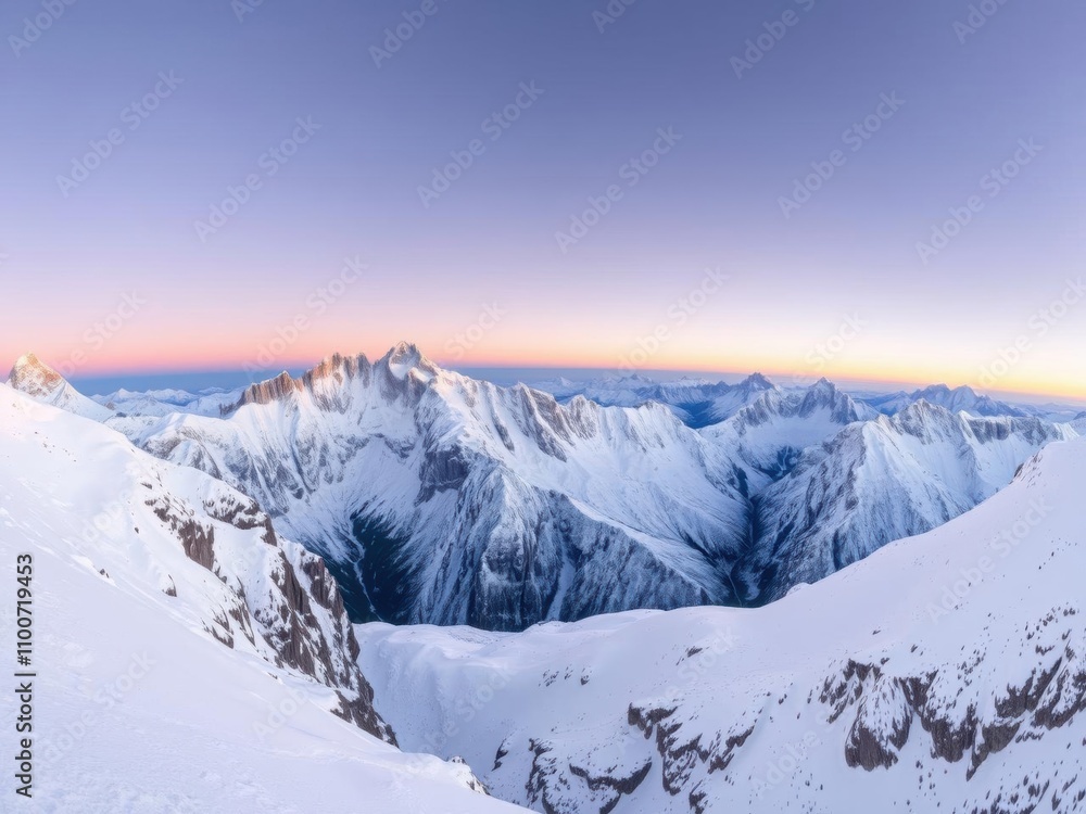 Fototapeta premium Beautiful panoramic view of a rugged mountain range covered in snow during sunrise, snow, mountains
