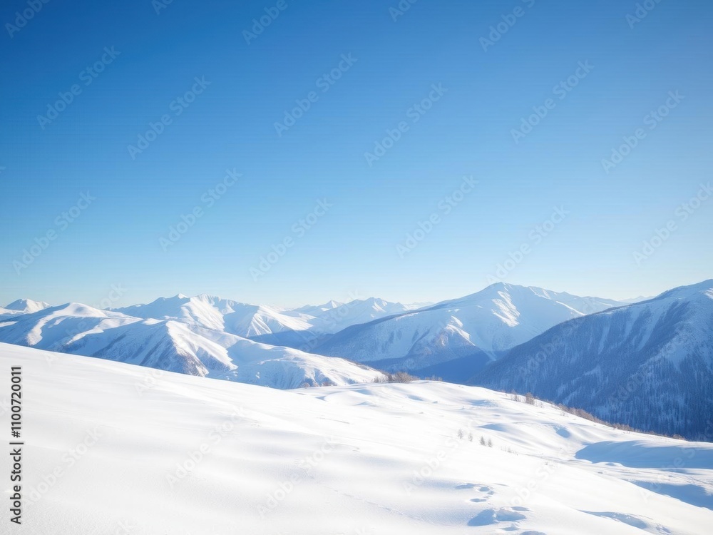 Fototapeta premium A serene winter landscape of snow-covered mountains under a clear blue sky, calm, winter