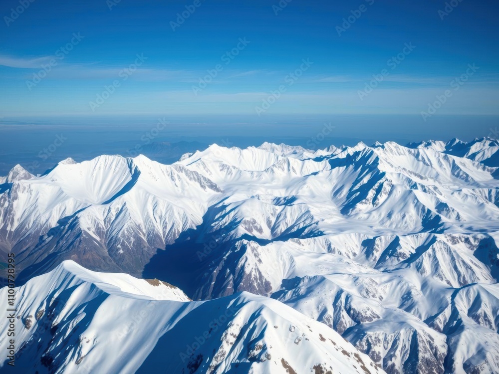 Fototapeta premium A breathtaking view of a snow-covered mountain range during a high-altitude expedition, rock formations, climbing