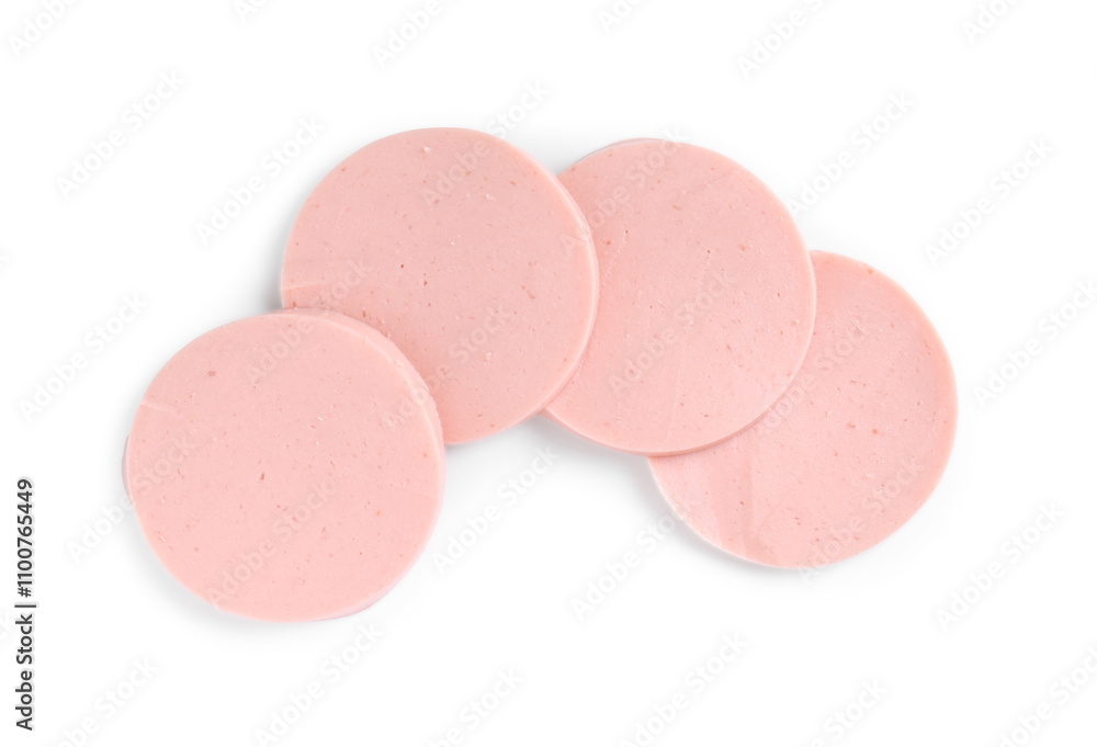 Obraz premium Slices of tasty boiled sausage isolated on white, top view