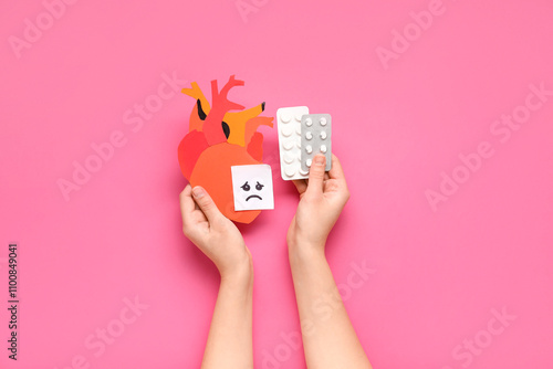 Female hands with paper hum...
