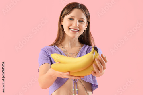 Young woman with bunch of b...