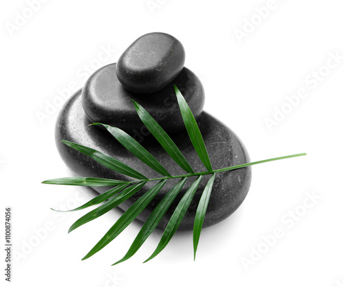 Photography Stack of black spa stones on white background