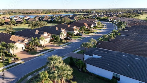 Foto South Florida homes with tile roofing in luxury subdivision