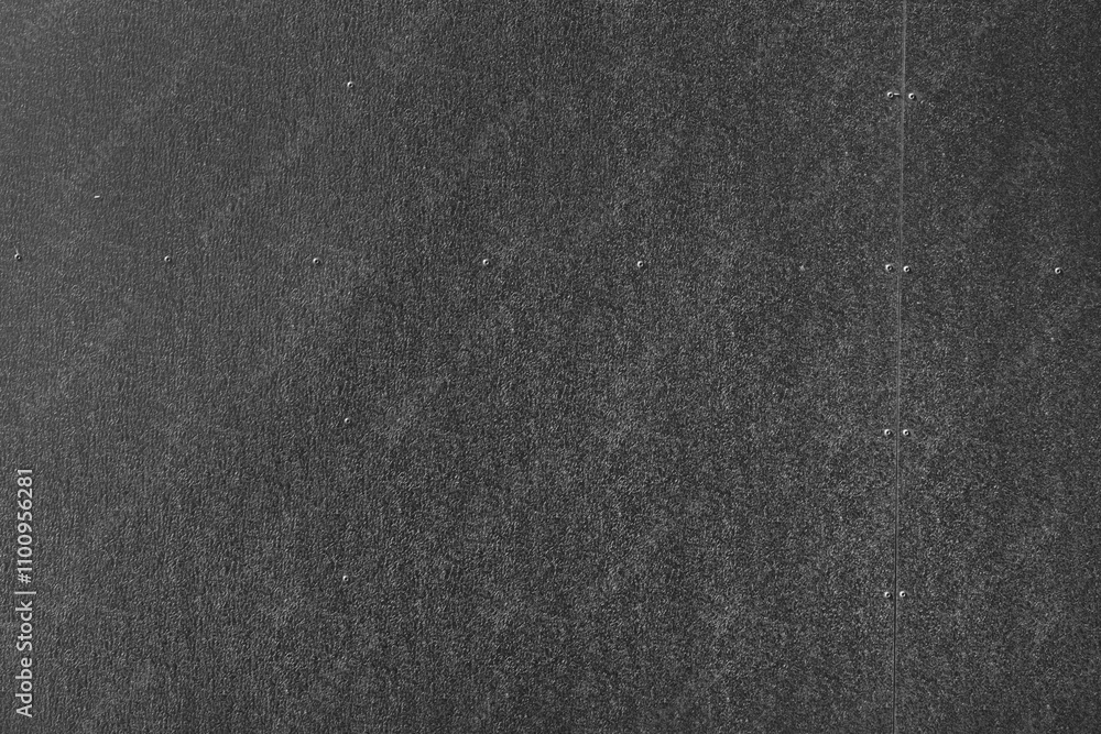 Obraz premium Wall surface covered with metal sheets.