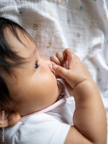 Newborn baby close-up family setting lifestyle photography indoor environment soft focus capturing family bonds photo