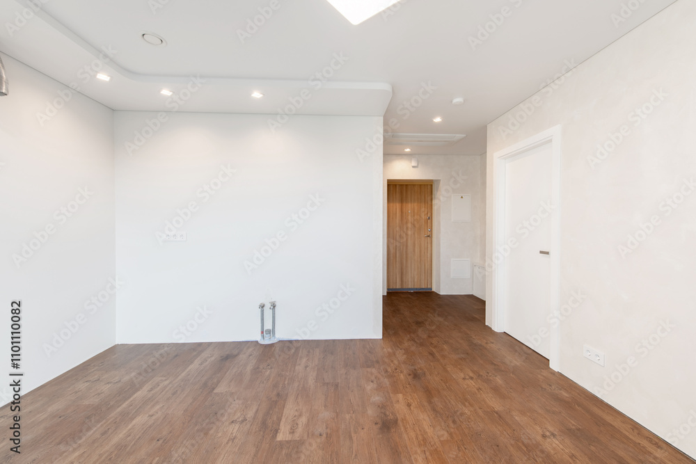 Fototapeta premium Empty Home Kitchen Interior. White Walls Room. Interior Empty Room with White Walls and Wooden Floor.