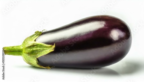 One fresh raw healthy eggplant or aubergine vegetable isolated on white background. Food ingredient, vegetatian cuisine, organic greenhouse farm plant. photo