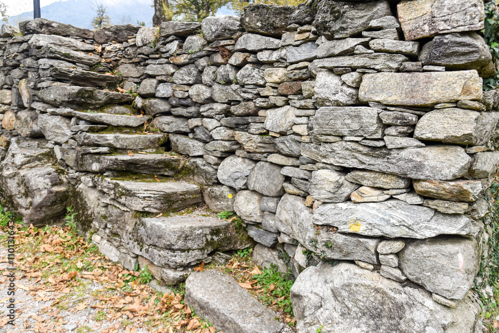 stone wall with stairs made with the the same stones
