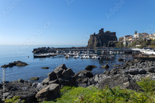 View of the coastal town of Aci Castello, province of Catania, Sicily, Italy photo