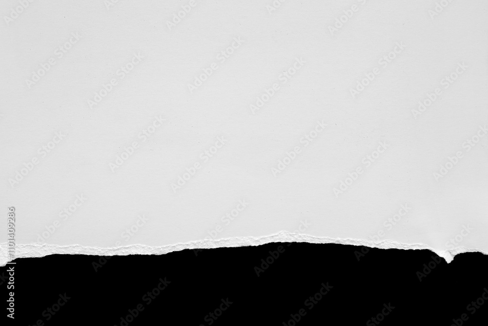 White torn paper texture on black background. White torn paper texture on black background.