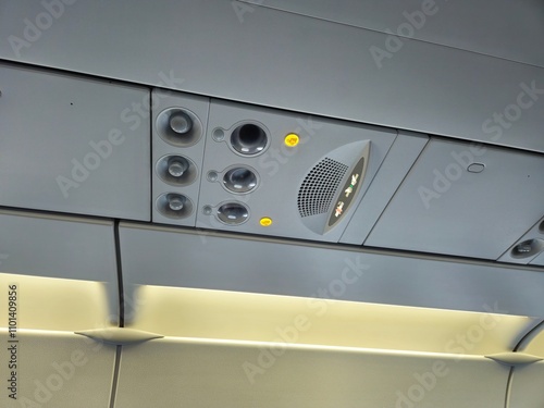 Ceiling and ventilation of the airplane. Aircraft interior.