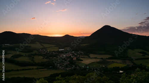 The landscape of the Bohemian Central Highlands and its highest mountain, Milešovka.
