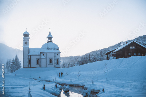 Seekirchl (Heiligkreuzkirchein) in rural winter landscape, Seefeld, Tyrol, Austria photo