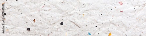 Textured paper background with colorful confetti pieces