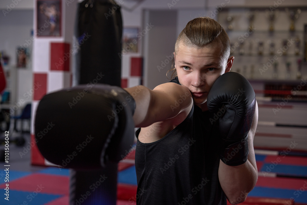 Kickboxer training in a kickboxing club Kickboxer training in a kickboxing club