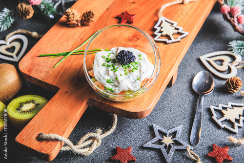 Kiwi salmon cream cheese and lumpfish roe verrine in studio photo