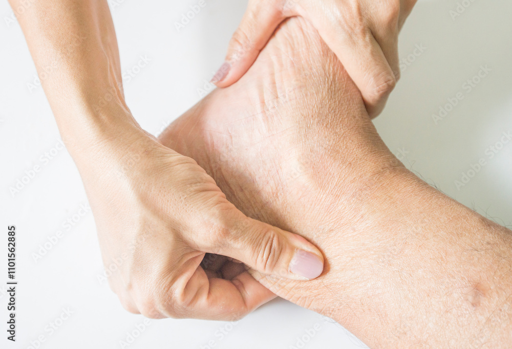 Fototapeta premium close up of a person receiving a foot massage